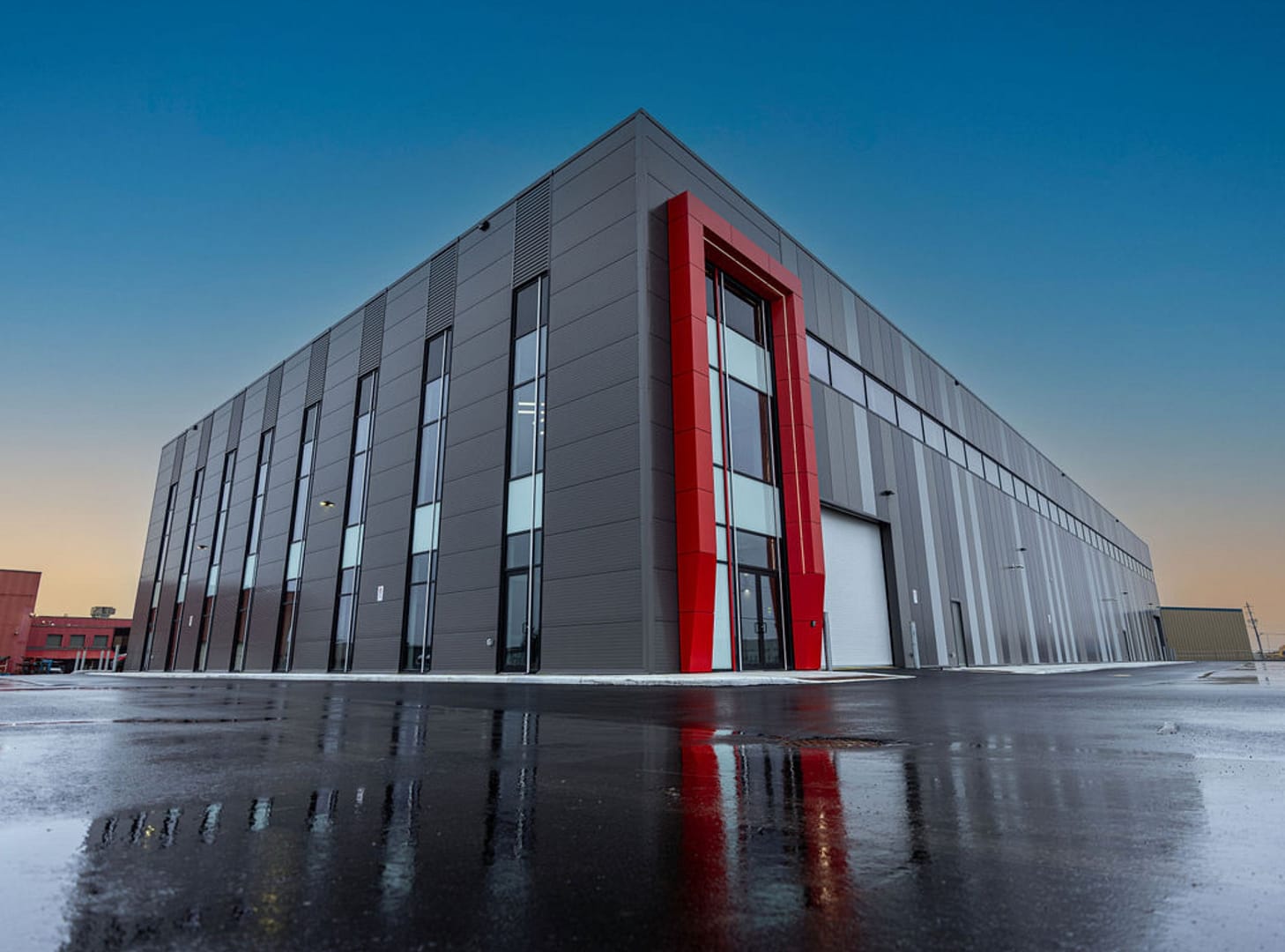 21 Commercial facility with gray cladding and red frame